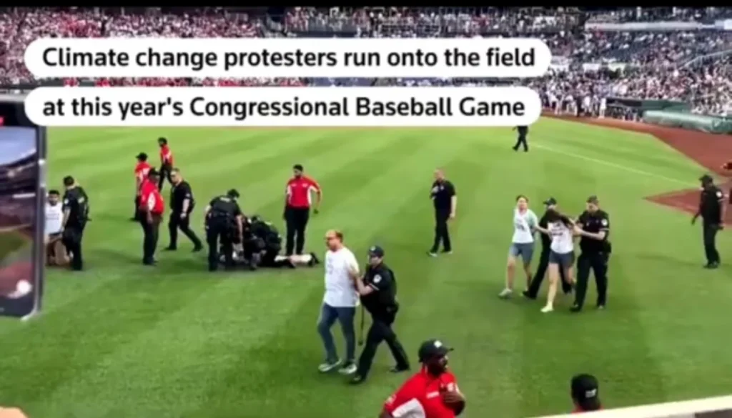 A photo of me being arrested at Nationals Stadium practicing peaceful resistance, as we blockaded and interrupted the Congressional Baseball game.